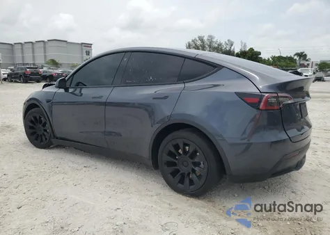 2023 Tesla Model Y z USA, uszkodzony, nr VIN 7SAYGDEE9PA041233